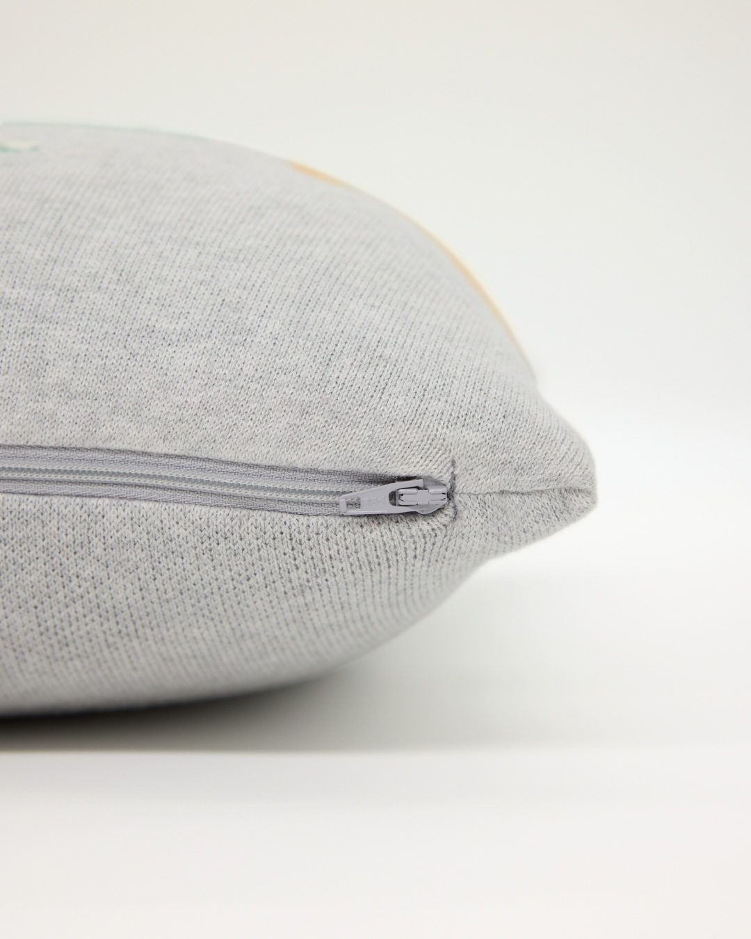 Snuggz Knitted Dinosaur Cushion With Filler